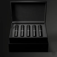 Thumbnail for Men’s luxury perfume discovery set presented in a premium black gift box