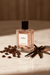 Thumbnail for Sora perfume displayed with coffee beans and vanilla pods